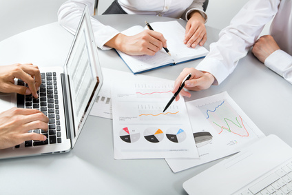 Business people discussing a financial plan Business people discussing a financial plan